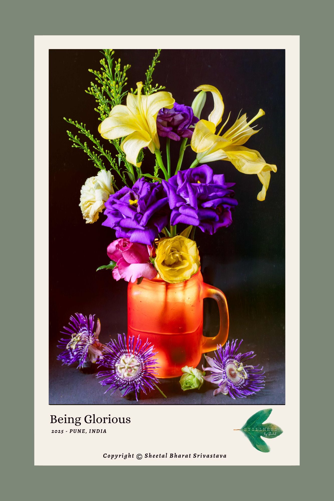 Photograph of Colorful yellow and purple flowers in a bright orange pitcher with a dark background